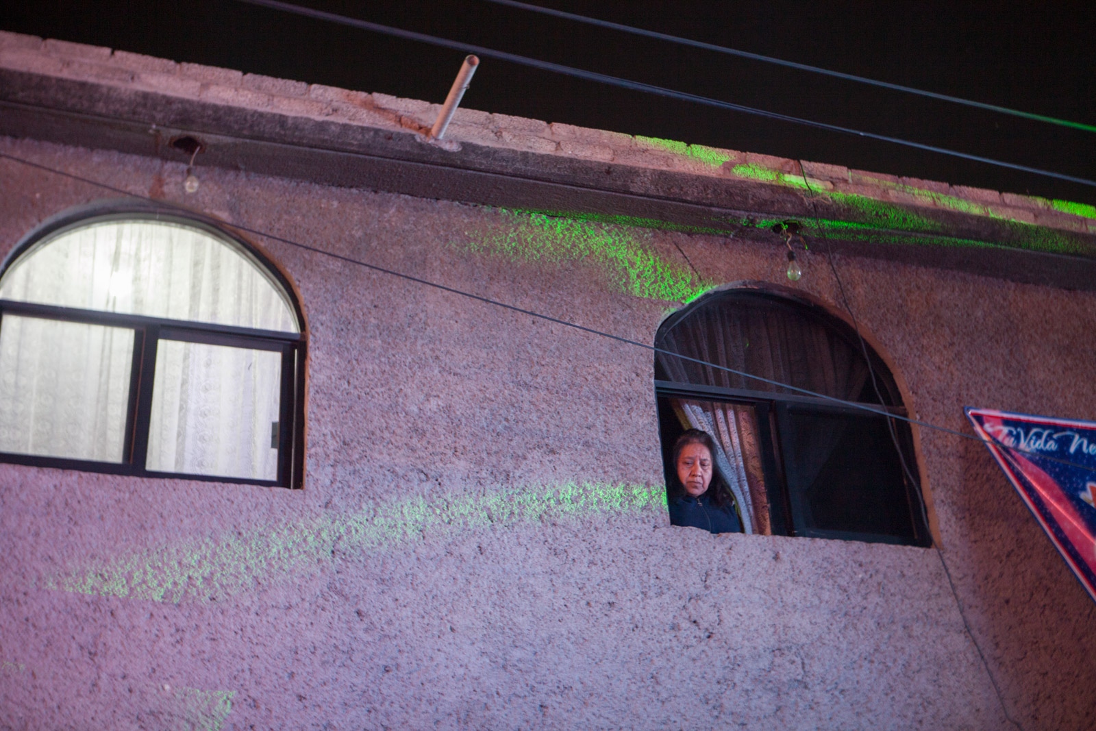  Â· Lady observes thru her apartment window the party outside. AragÃ³n, Mexico D.F. February, 2015. // &nbsp;Â· SeÃ±ora observa desde su ventana la fiesta afuera. AragÃ³n, Mexico D.F. Febrero, 2015 