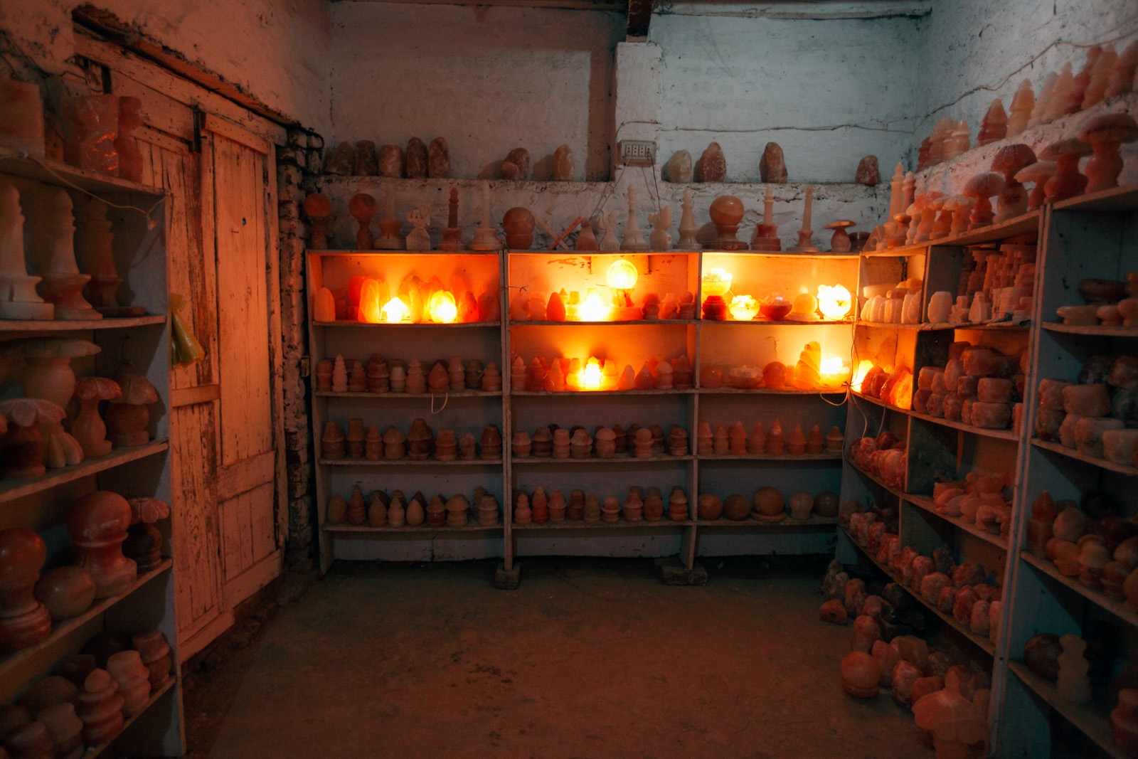 PAKISTAN'S SALT MINES - Objects carved out of pink rock salt extracted from the...