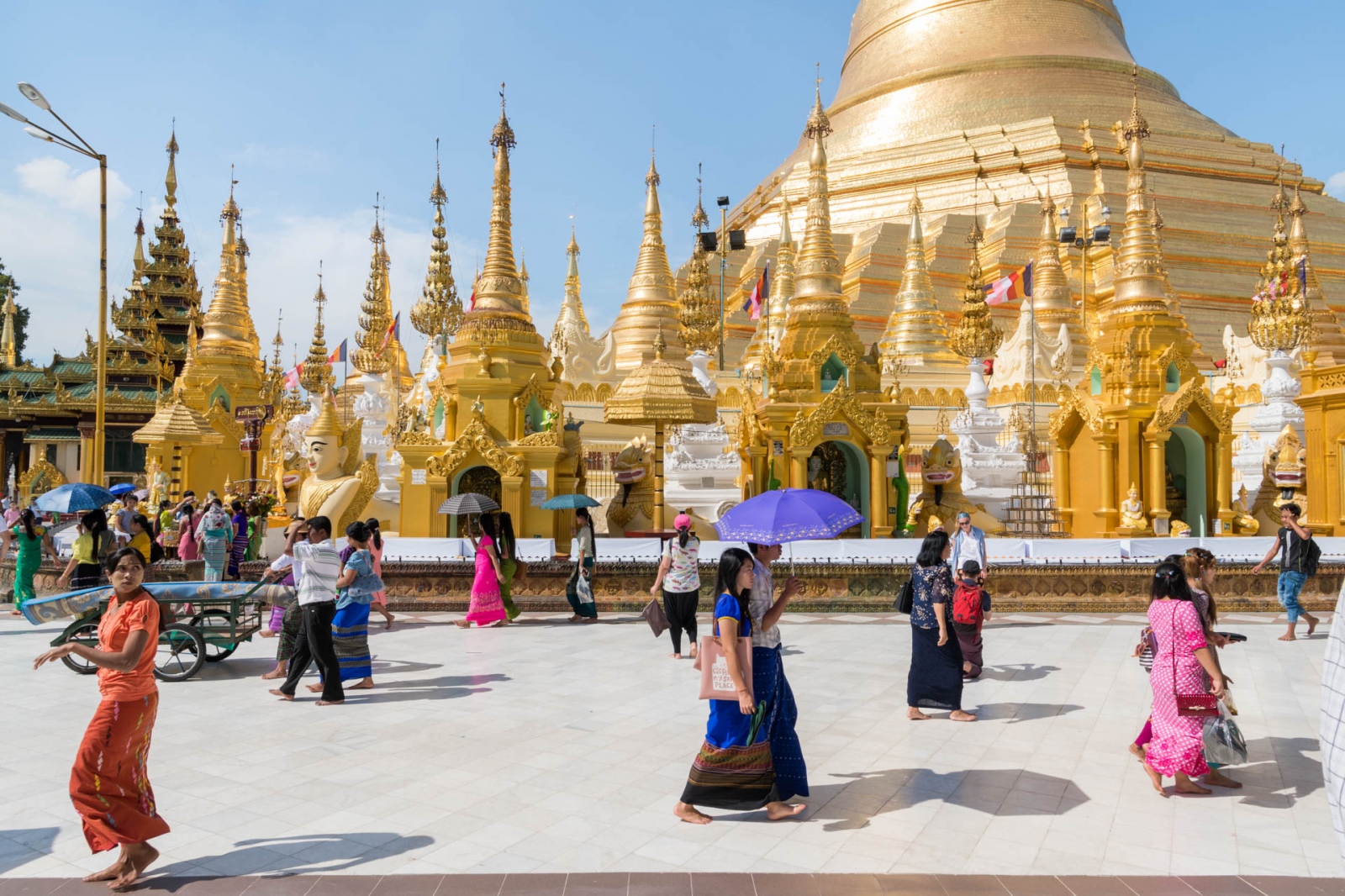 Shwedagon Paya square in Yangon, crowded at any time of the day.