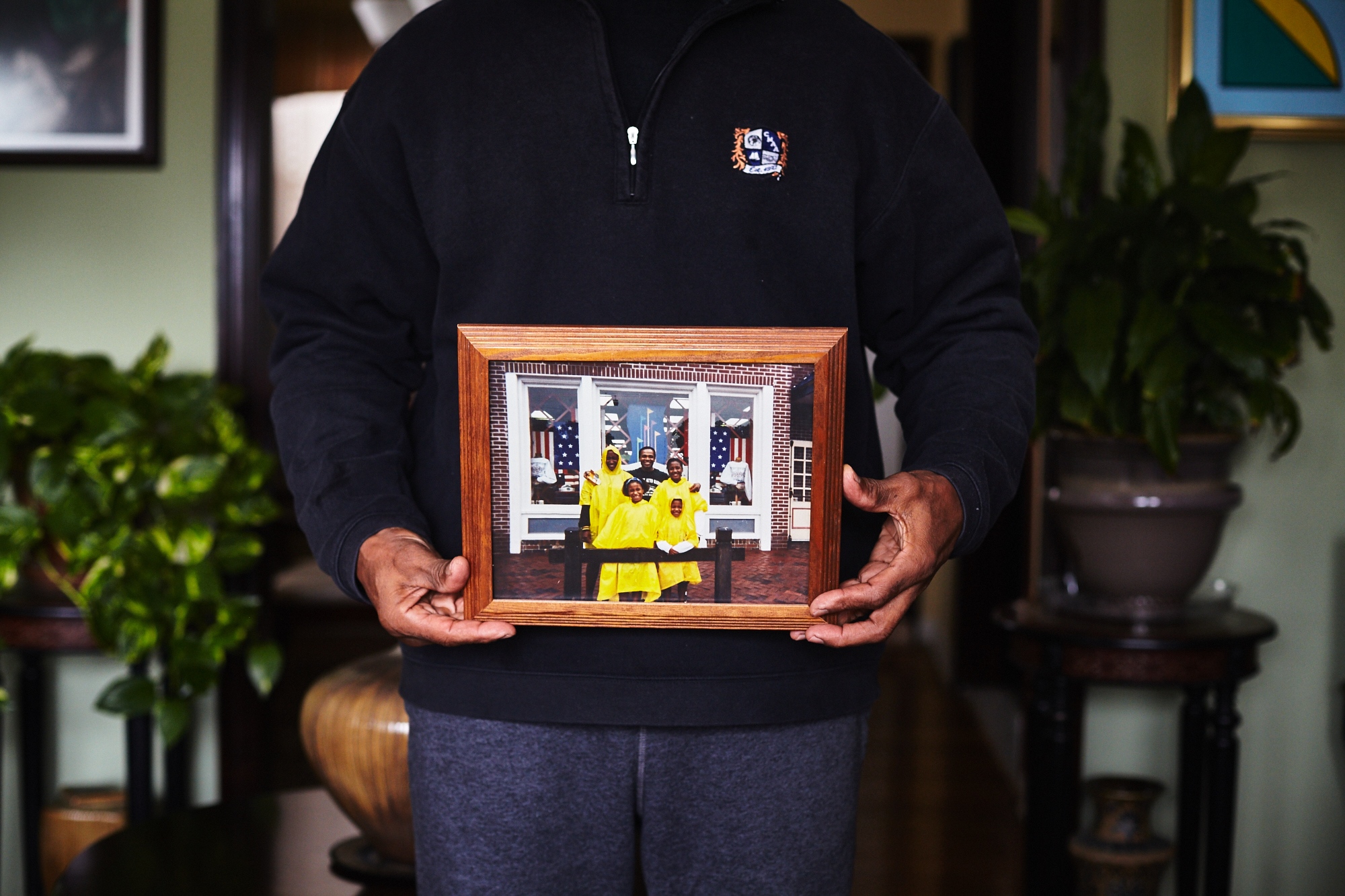 You Don't Look Sick - Robert's Father, Robert Sr. holds a family photograph...