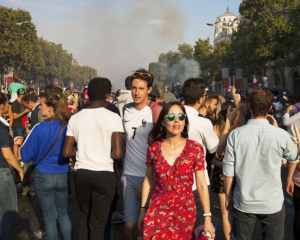  For hours, fans await for the french team at the Champs &Eacute;lys&eacute;e avenue in...