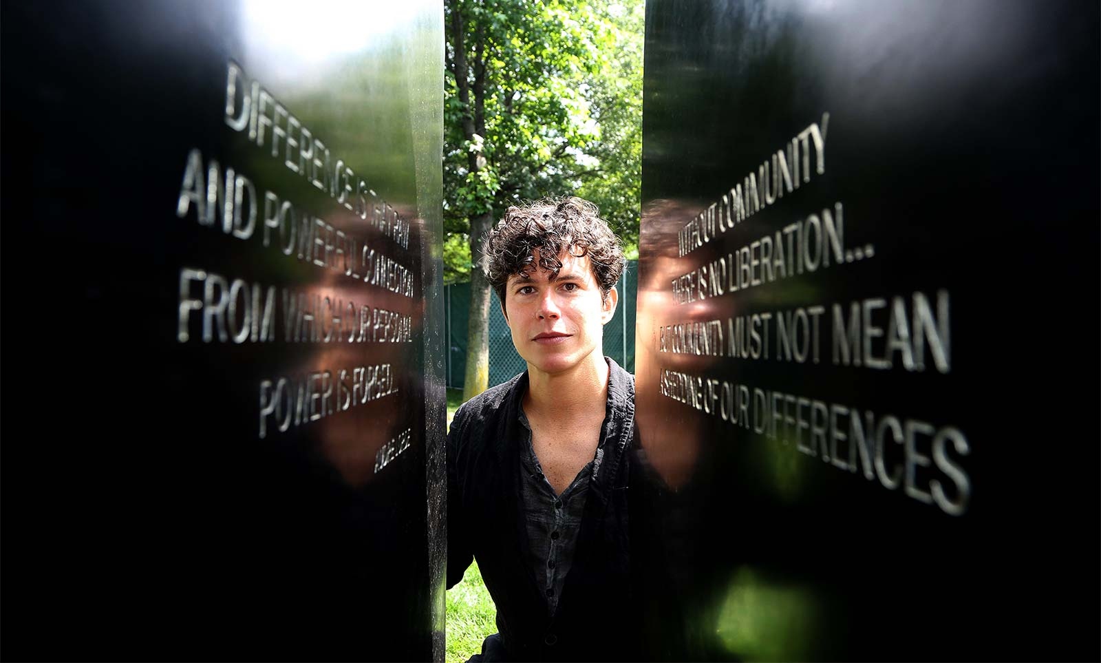  Sculptor Anthony Goicolea next to his LGBT Memorial Honoring Victims of Hate, Intolerance and Violence at the Hudson River Park. 
