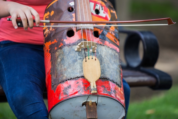 Image from Landfill Harmonic  -   Cello is made out of an oil container, a wooden spoon...