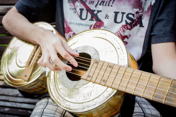 Image from Landfill Harmonic  -  Guitar made out of two cans of sweet potatoes. 