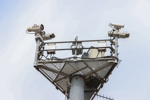 Image from Friendship Park  - Multiple cameras and sensors pointed at the border entrance.