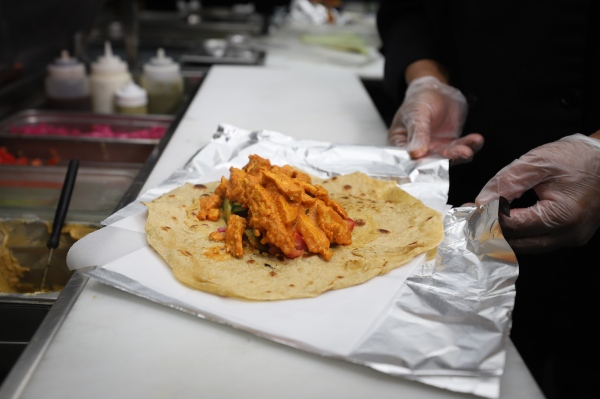 Image from Best Indian Food At Gas Station  -  Indian Burrito /Chicken Tikka Masala. 