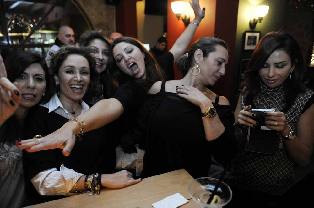 Kteer Jeune (Very Young) - Women enjoy themselves during a birthday dinner at 'The...