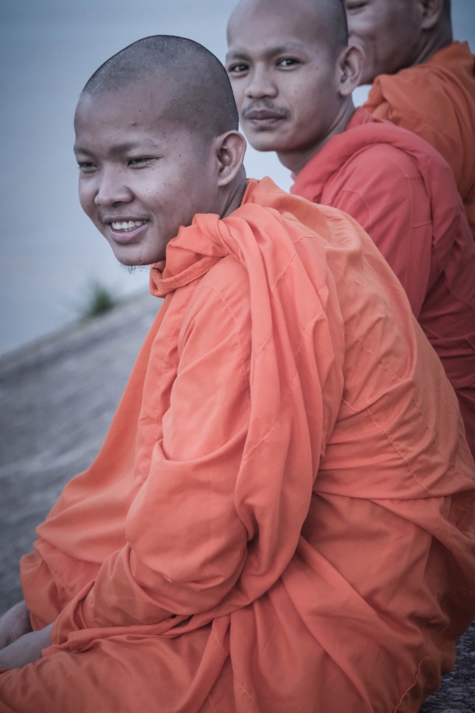 Phnom Penh Novices relaxing on the banks of the Mekong,