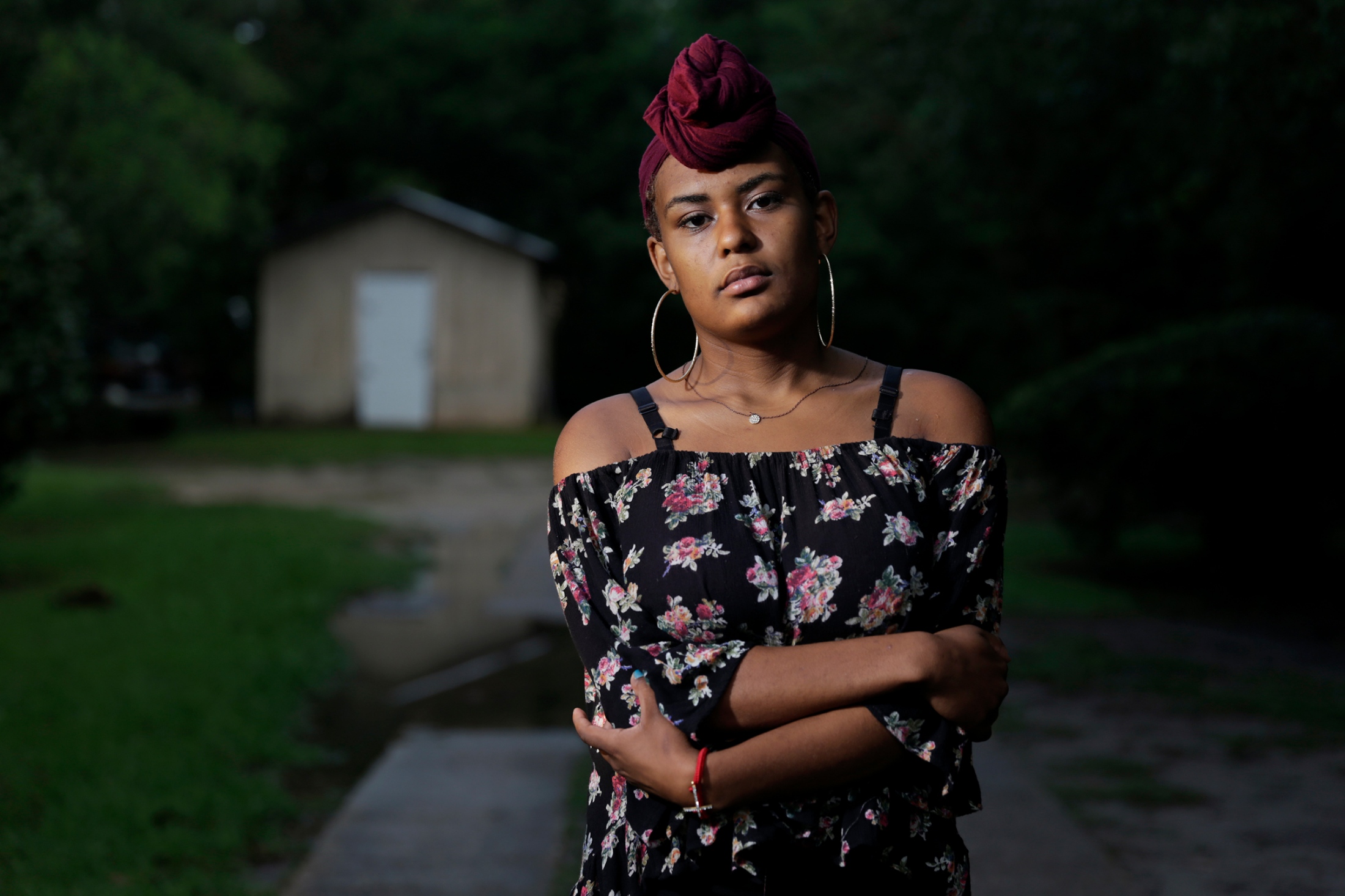 New: Treading Water -  Ravyn Frazier stands outside of drop-in center Going...