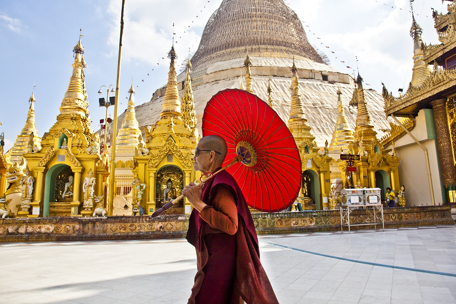 Buddshist monk in Shwedagon pag... most sacred pagoda in Myanmar.