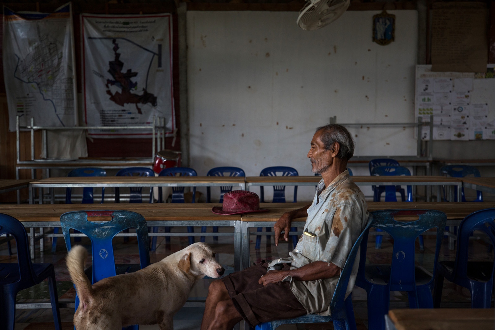 A VILLAGE UNDER SIEGE - Pasit Bunban, a village elder of Klong Sai Pattana...