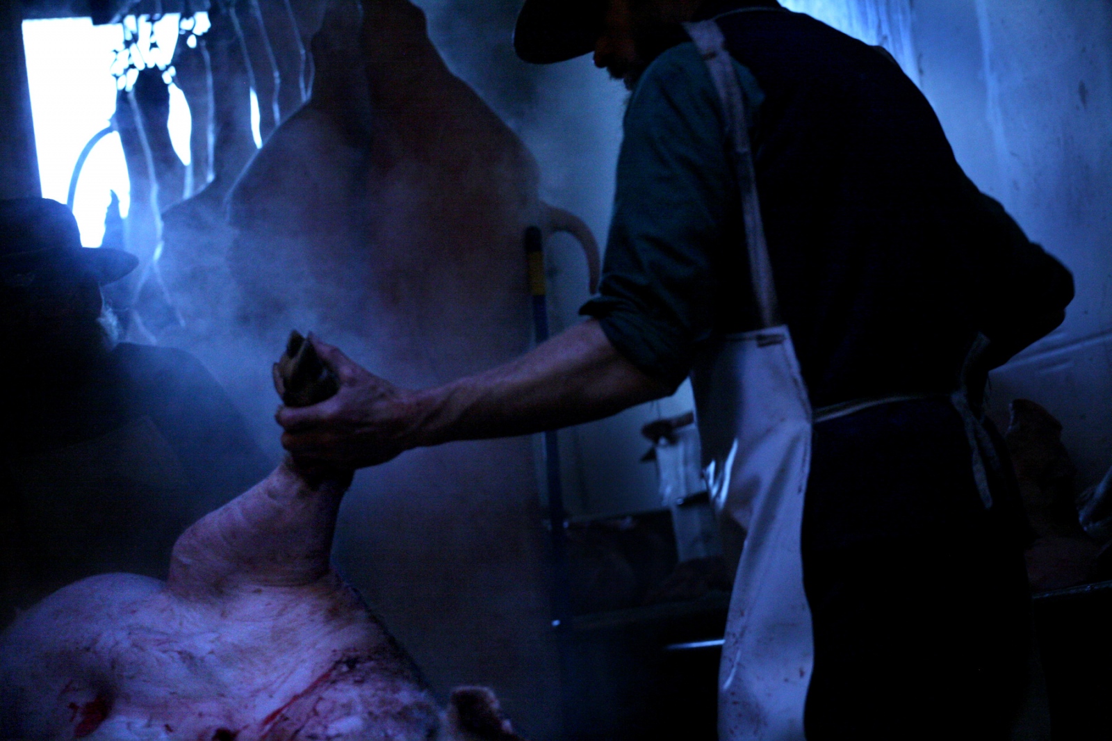  HOG KILL December is hog killi...ter, butchering and packaging. 