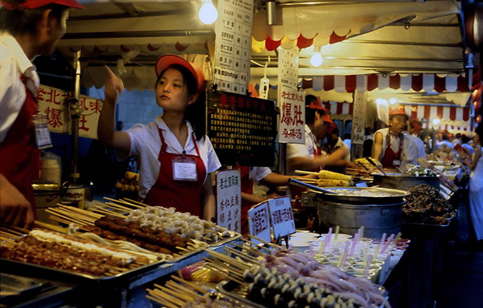 Singles -  Co-workers have a spat at an outdoor food-vending market...
