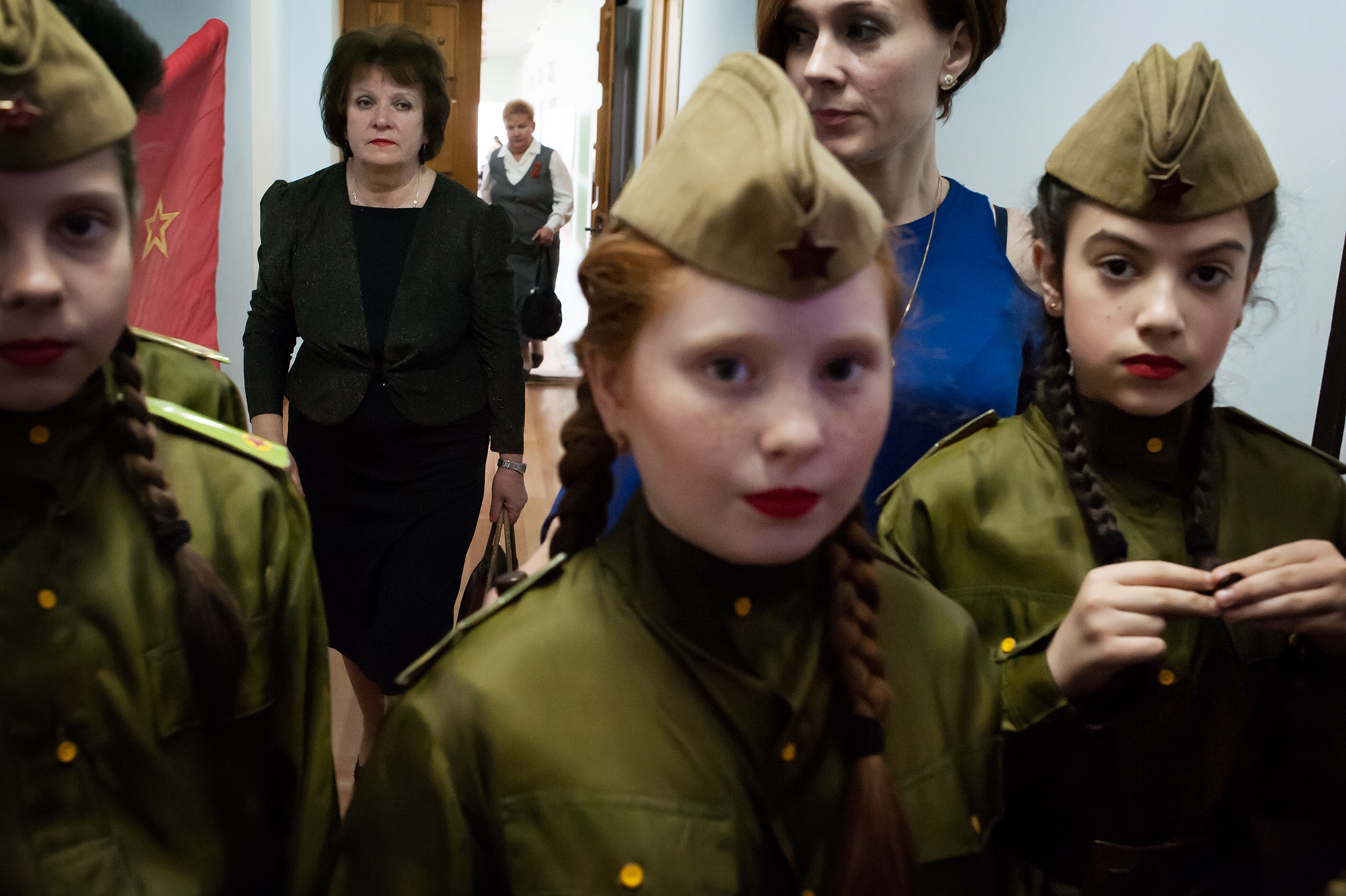 Transnistria - Children prepare for a performance to commemorate the...