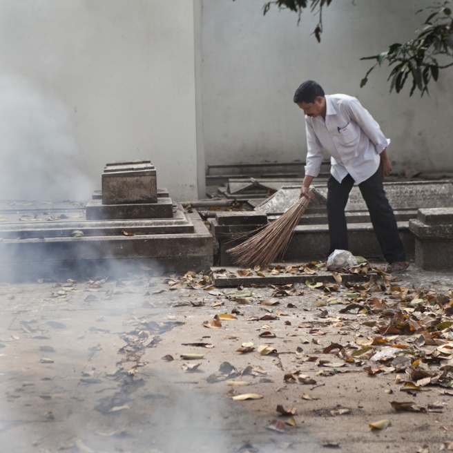 The cemetery gets cleaned befor...January, 2012. Calcutta, India.