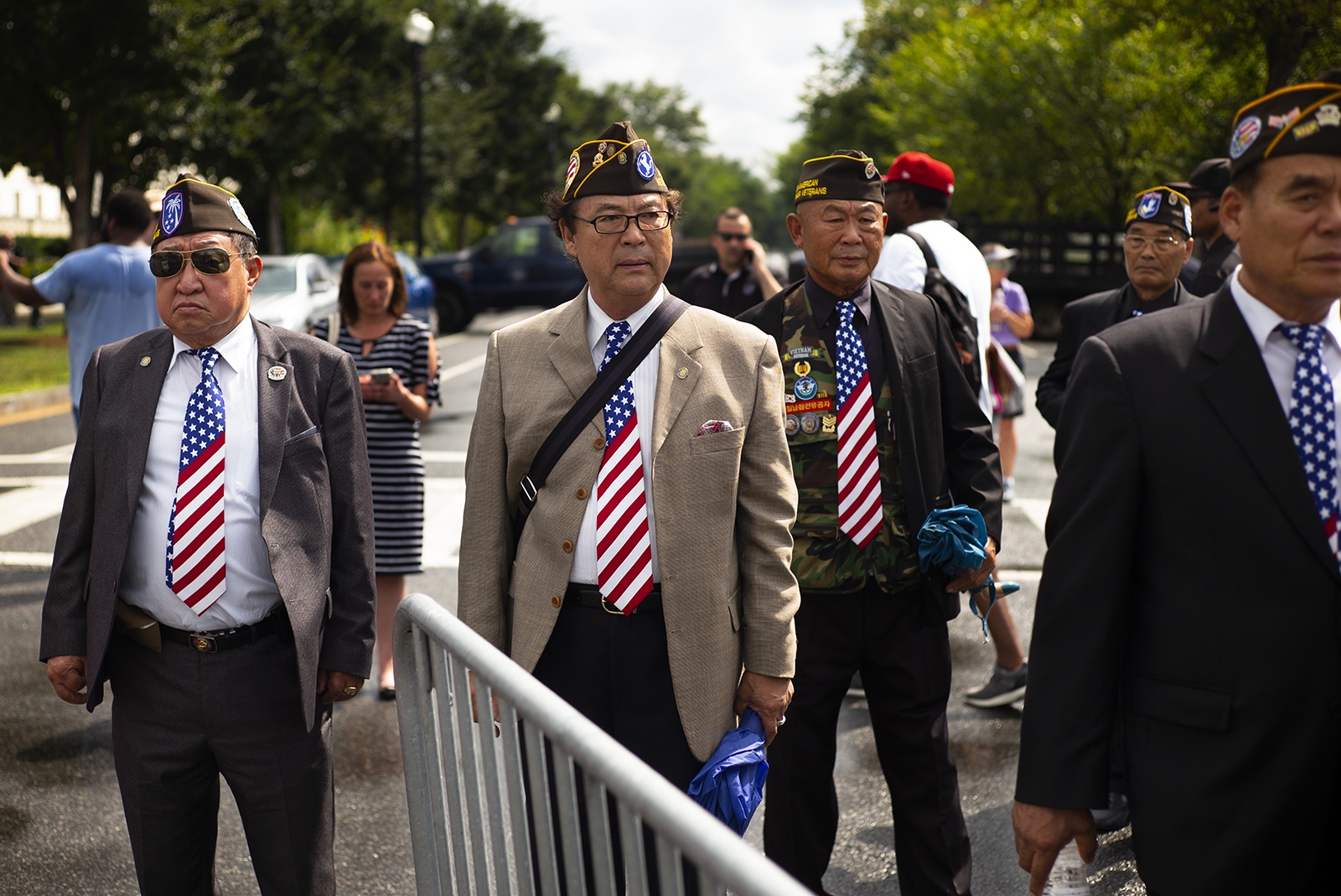 American Flags - Korean-American veterans waiting to honor President...