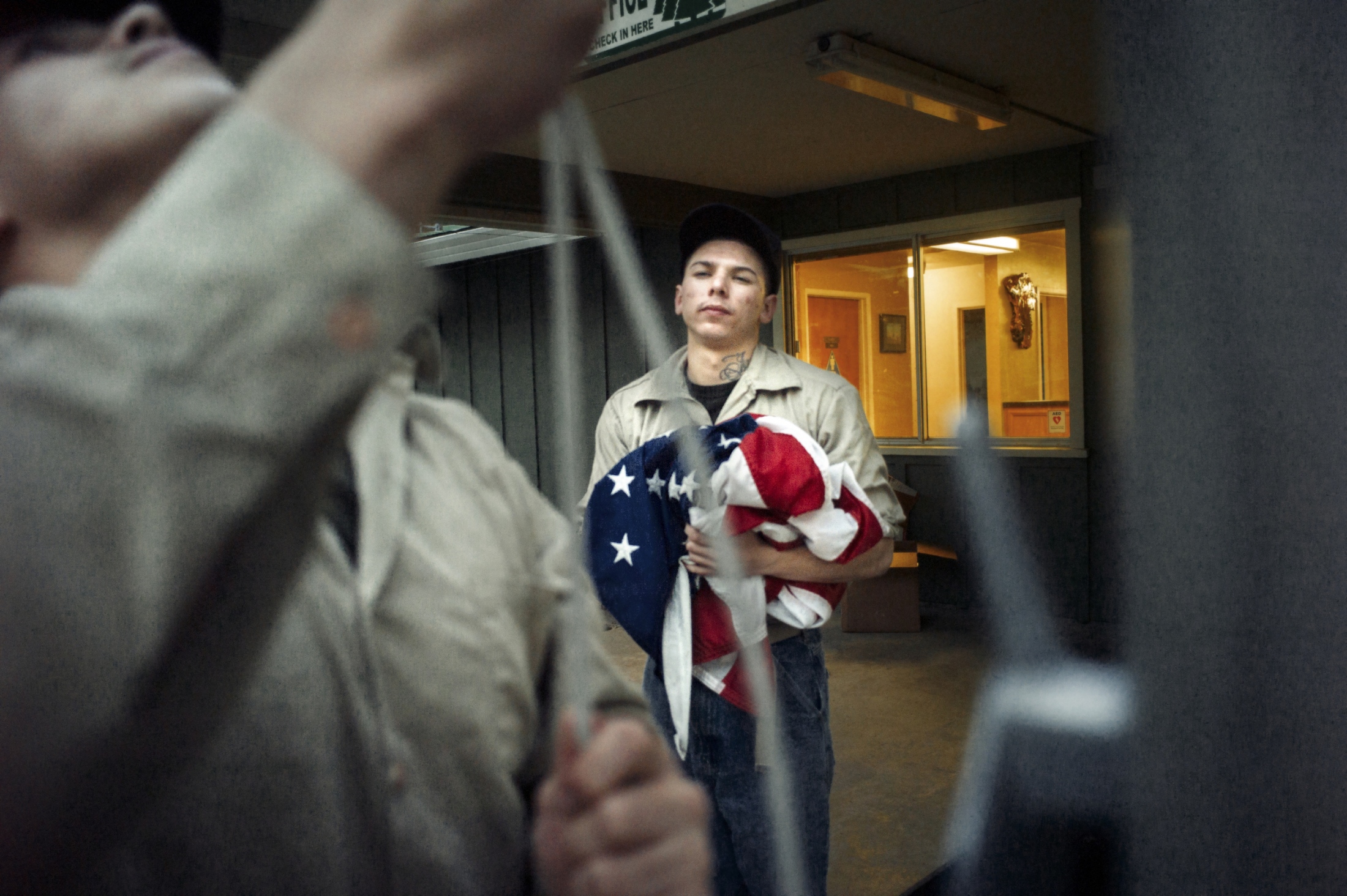 Out of Bounds - Inmate Marcus Tapia reluctantly collects the American...