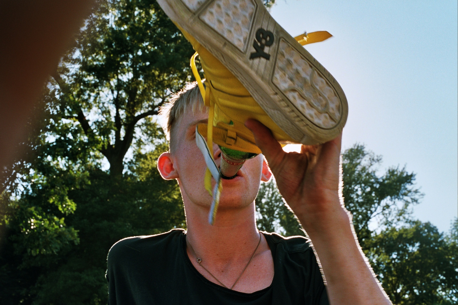 Dan drinking out of a shoe, Brooklyn, NY