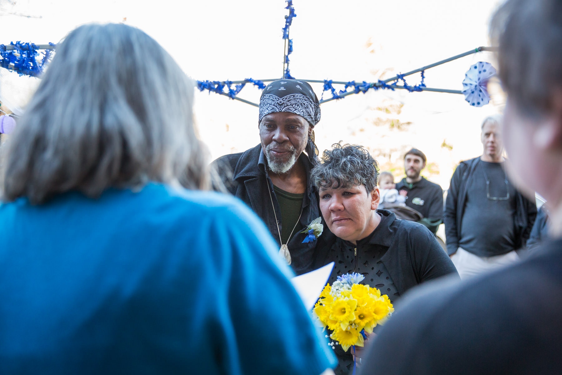 Homeless Vows | NY Times - Ms. Vestal and Mr. Kitcheon listen as their officiant,...