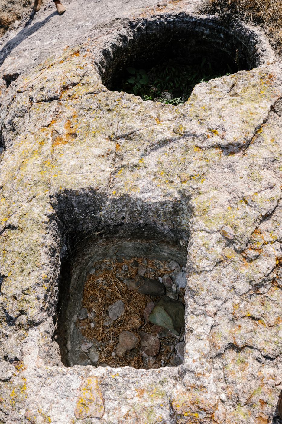 Square pits that were chiseled ...great-great-great grandfather. 