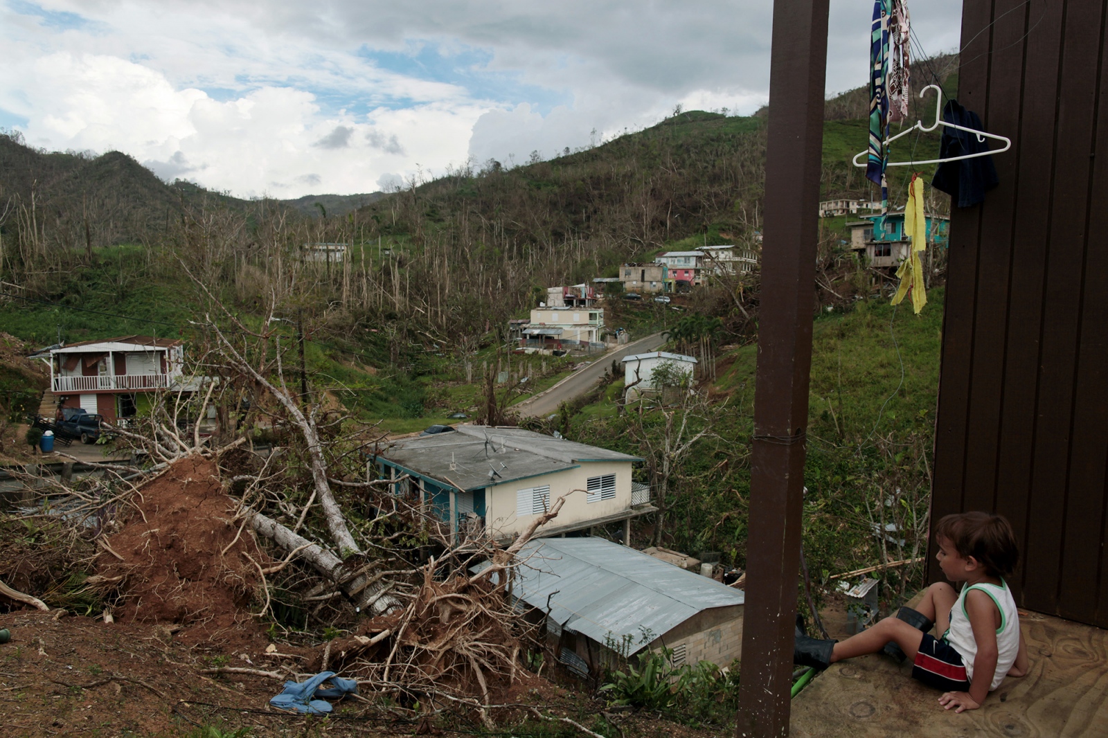 Destroyed bridge imperils village cut off by Hurricane Maria - 