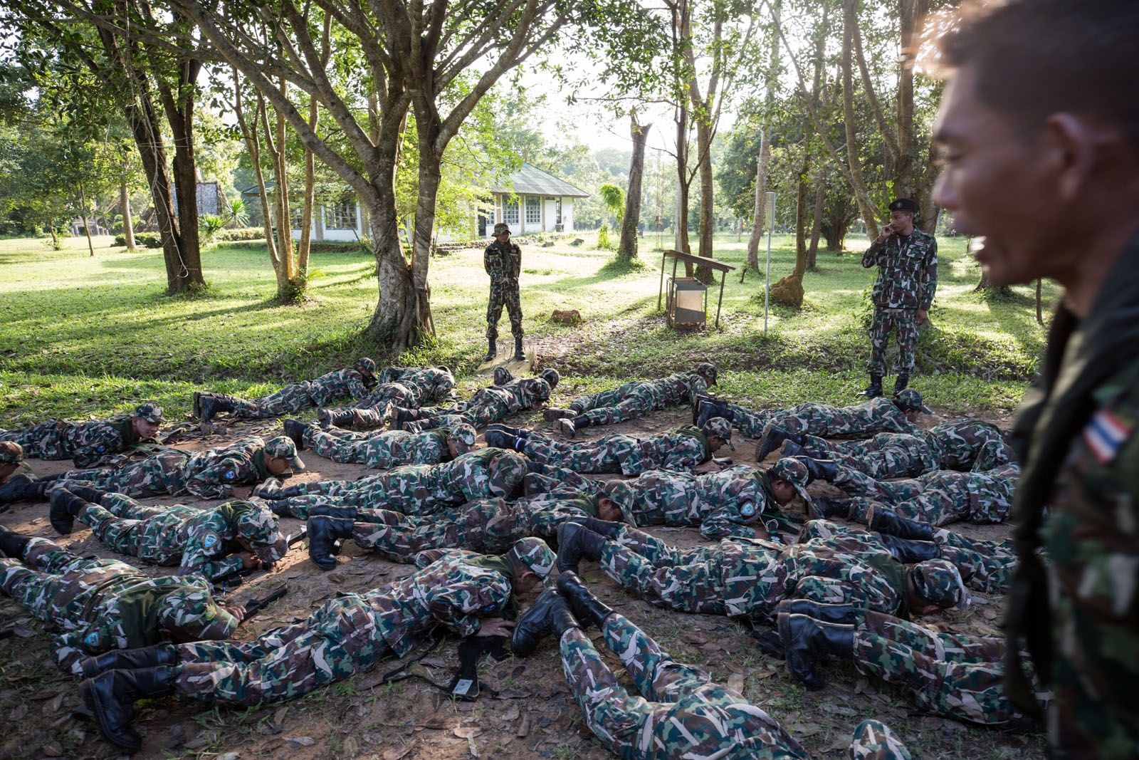 THAILAND'S FOREST RANGERS - New forest ranger recruits are ordered to do pushups...