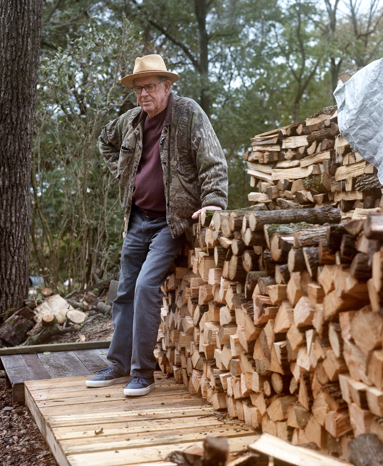 Love, Dad - Grandpa Posing by the Wood Pile