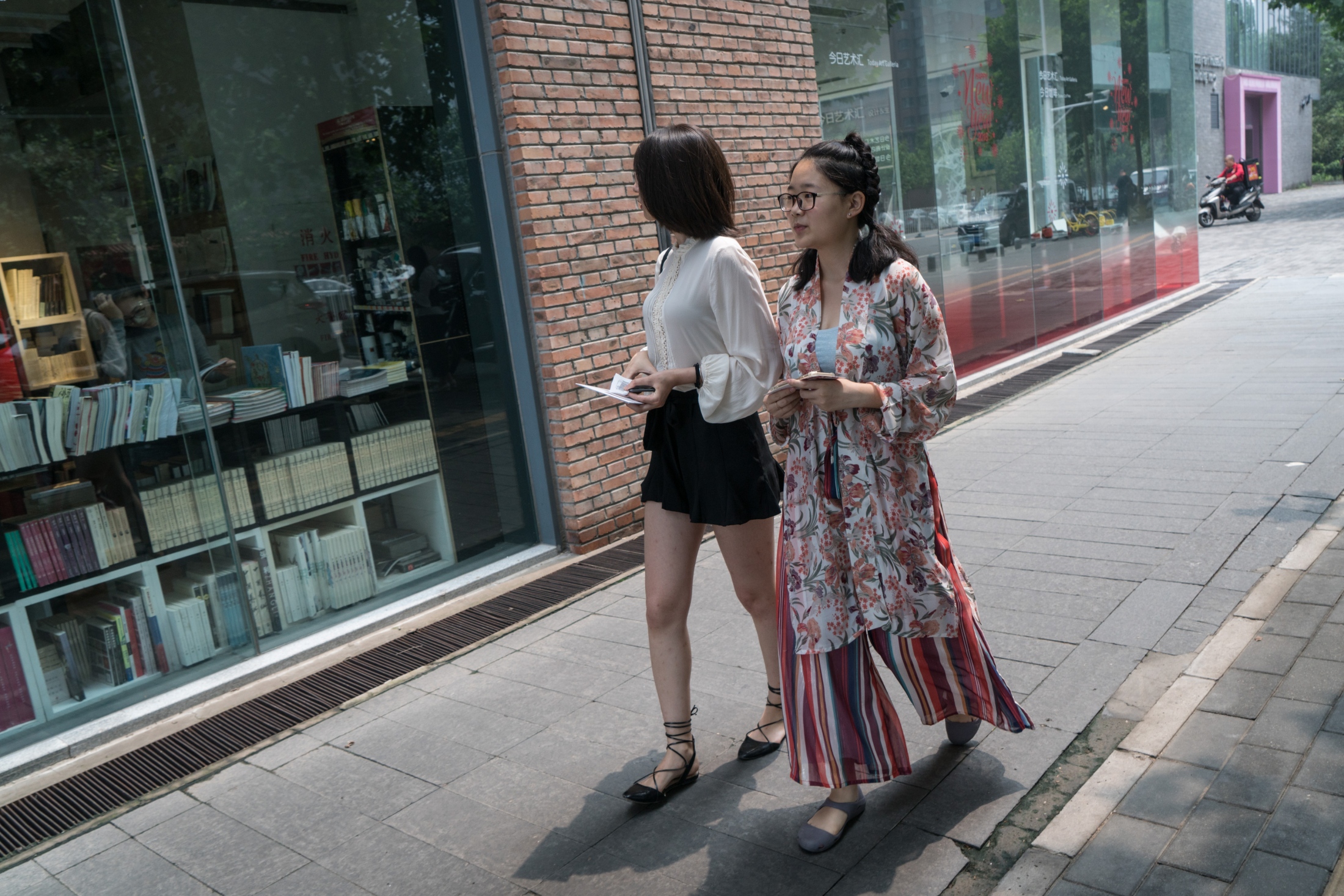The Hanfu Revival -  Xu Chulin (R), dressed in Hanfu, walks in the street in...