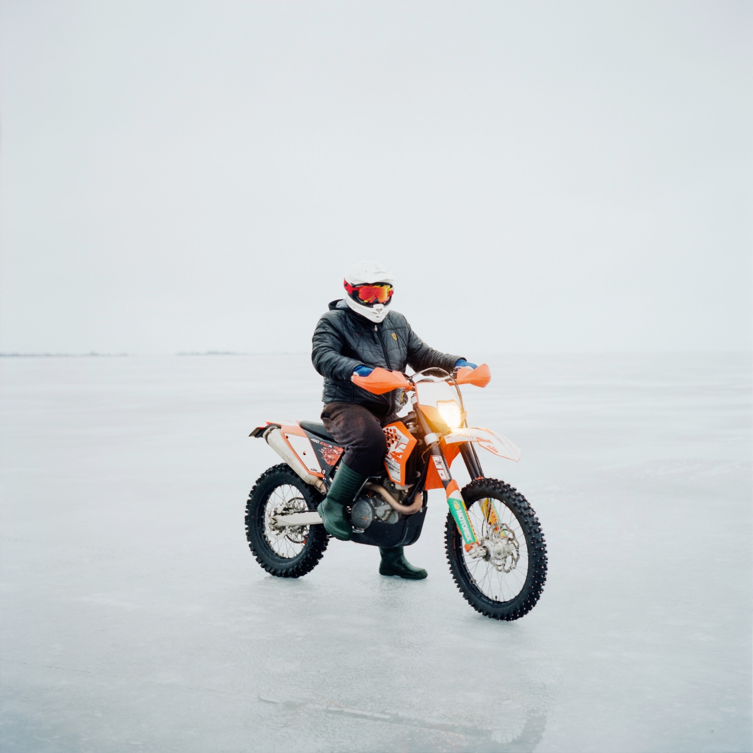 The L&auml;mmij&auml;rv lake, a natural border between Estonia and Russia. The border runs through the middle of this lake, where this biker plays on the Estonian side of the border.