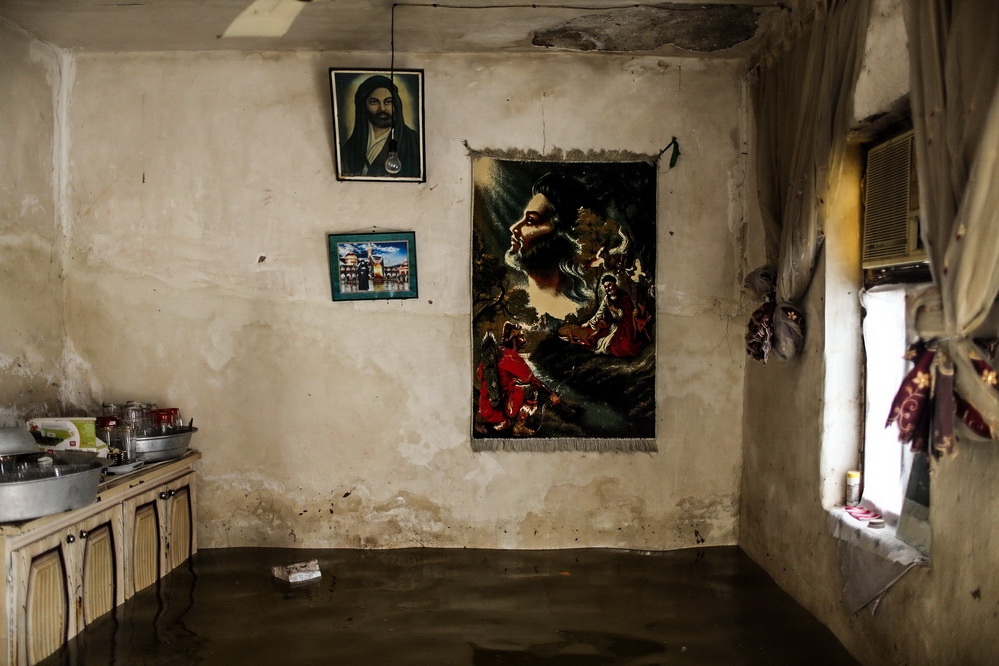 When the flood swept our homes -  View of a flooded house in the Ein 2 erea . at this area...