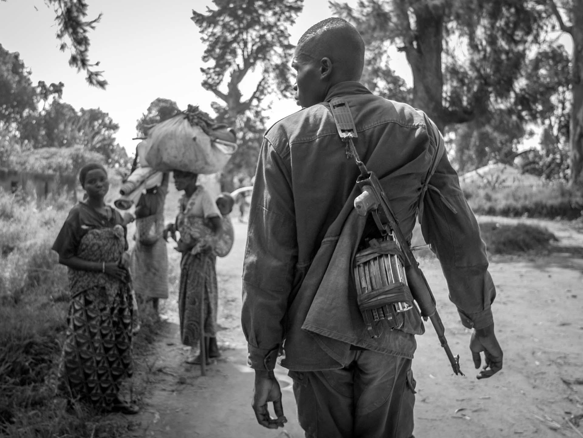  A solder roams along the path of IDPs (Internally displaced people) in the village of Gety, 60 km southwest of Bunia a regional capital of...