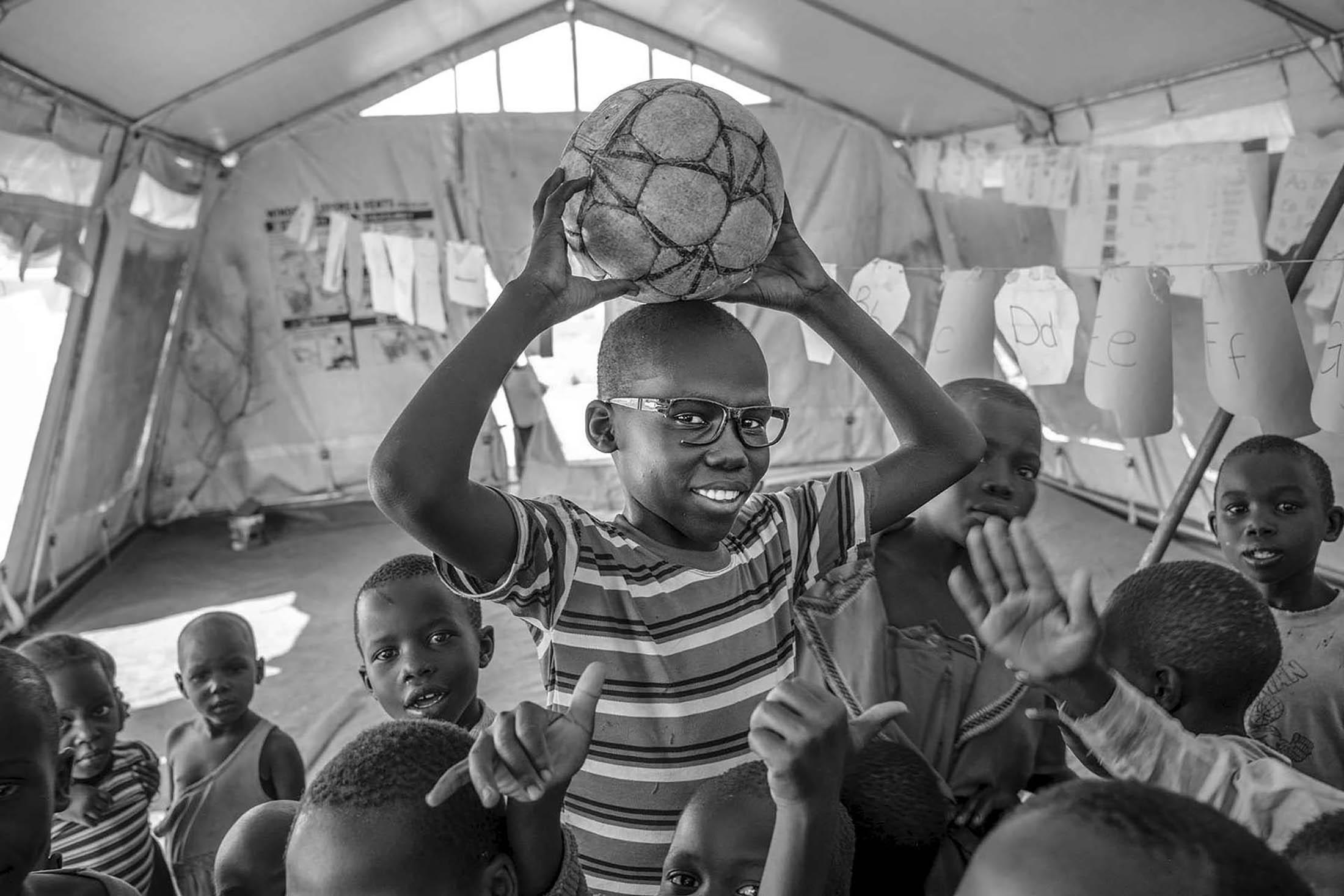 Exodus: South Sudan -   Children at play at a child friendly space created by...