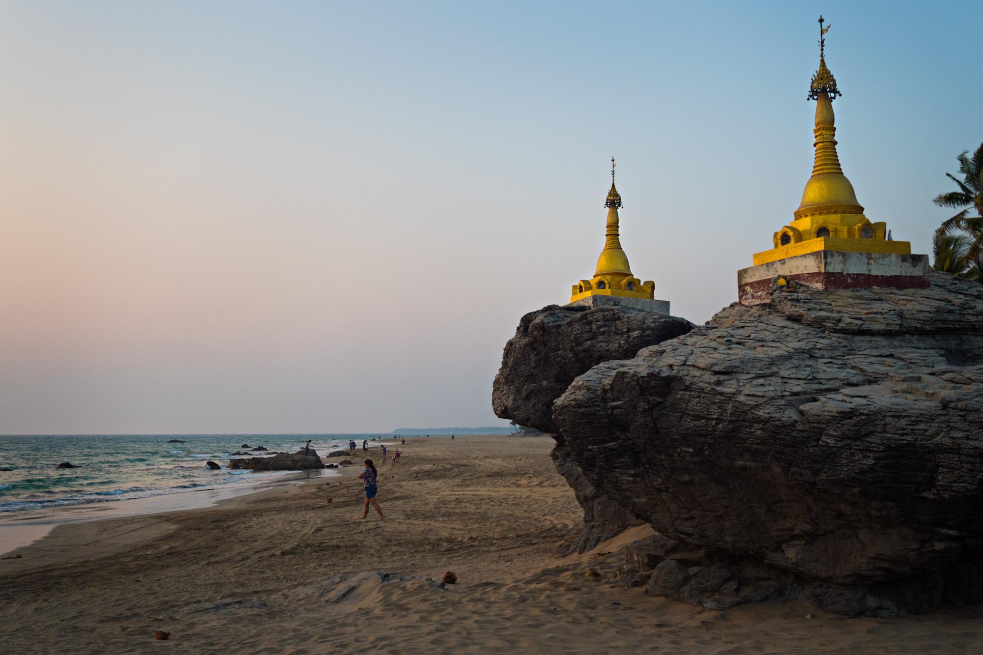 Travel - Pagodas are seen on rocks at Ngwe Saung beach, Myanmar,...
