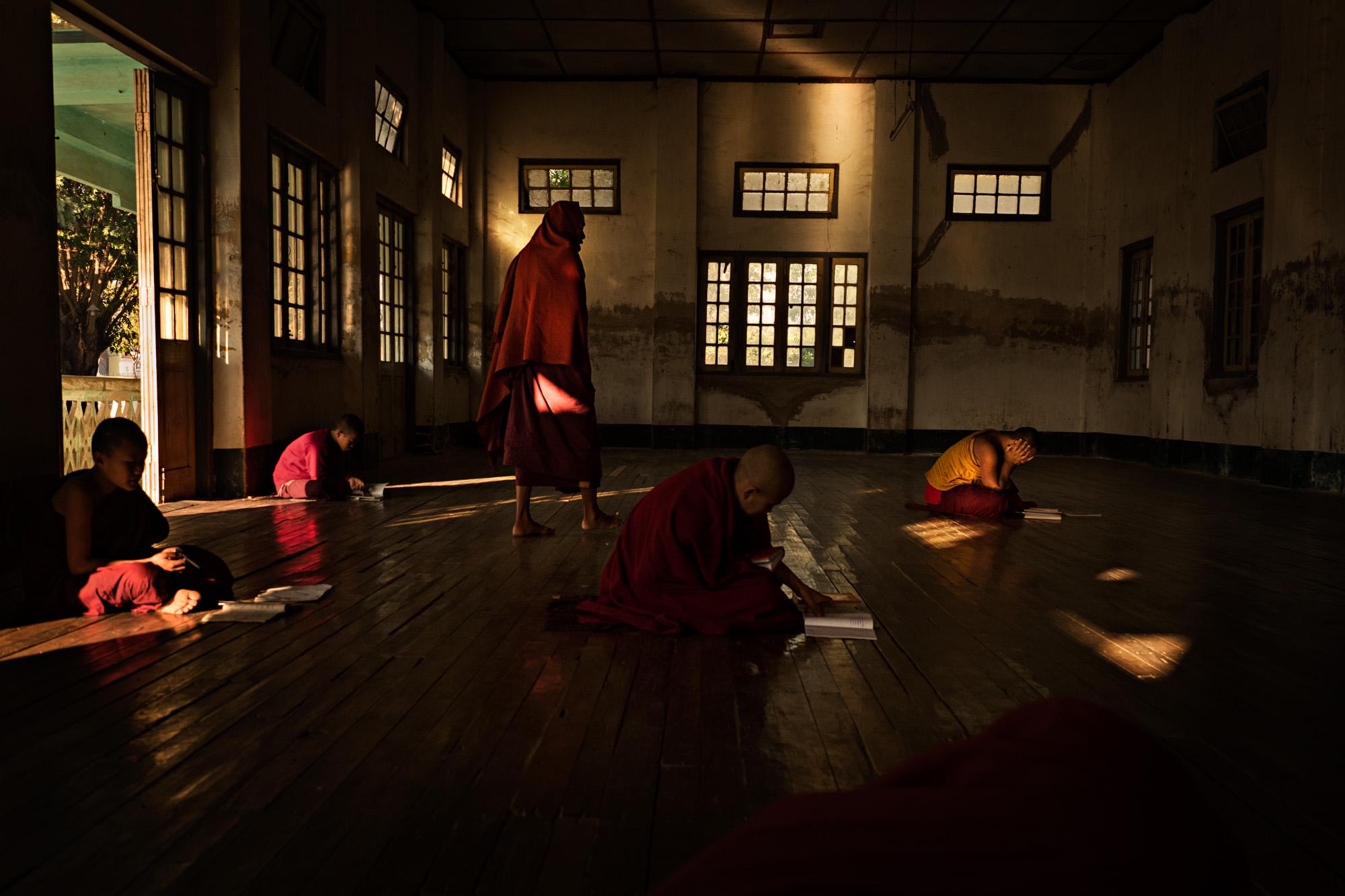 Travel - Novice monks engage in lessons at a small monastery in...