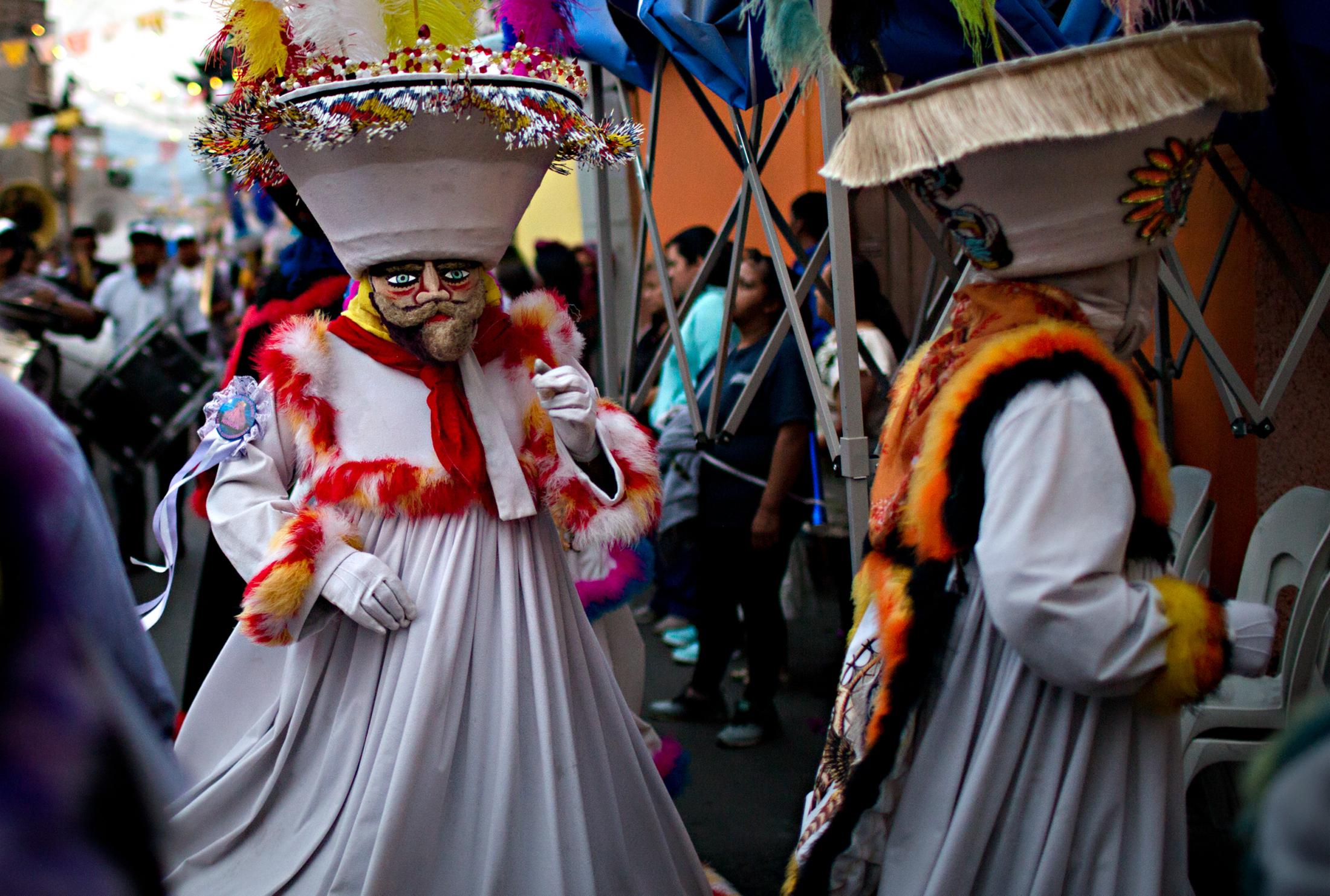 God Child of Xochimilco - Niñopa always leaves home preceded by dancers and...