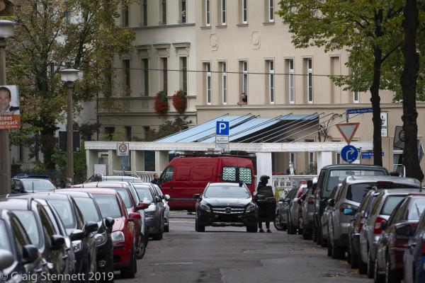 Synagogue Shooting, Halle (Saale), Germany -   A man looks on to Ludwig Wucherstrasse as the Police...