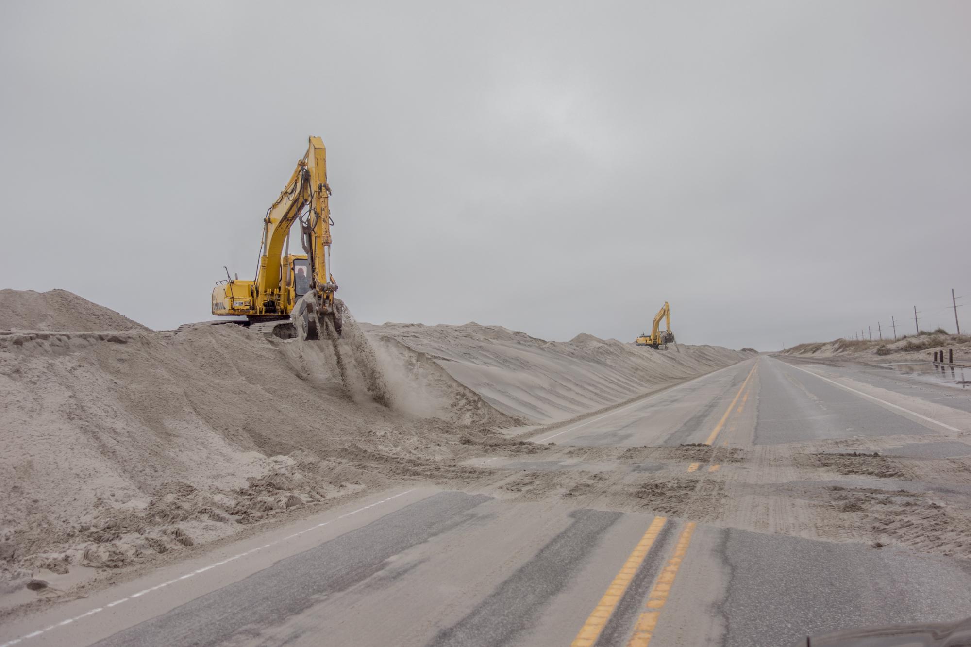 Shifting Sands - Windblown sand and over-wash along NC-12 on Cape Hatteras National Seashore is responsible for...