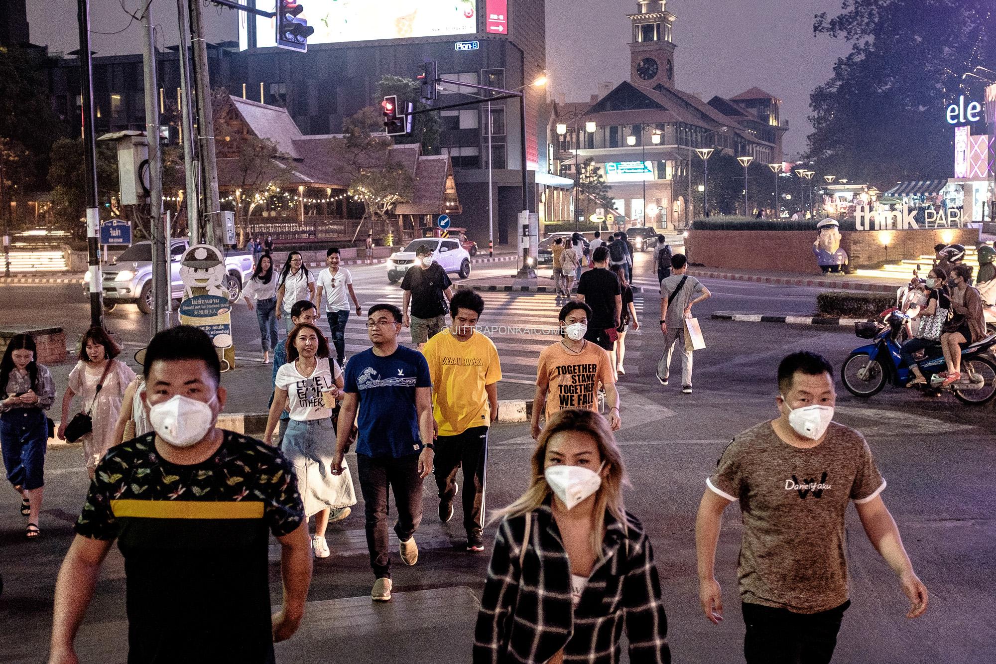  The Chiang Mai sky is covered all over by smoke. Locals and foreigners alike are affected by...