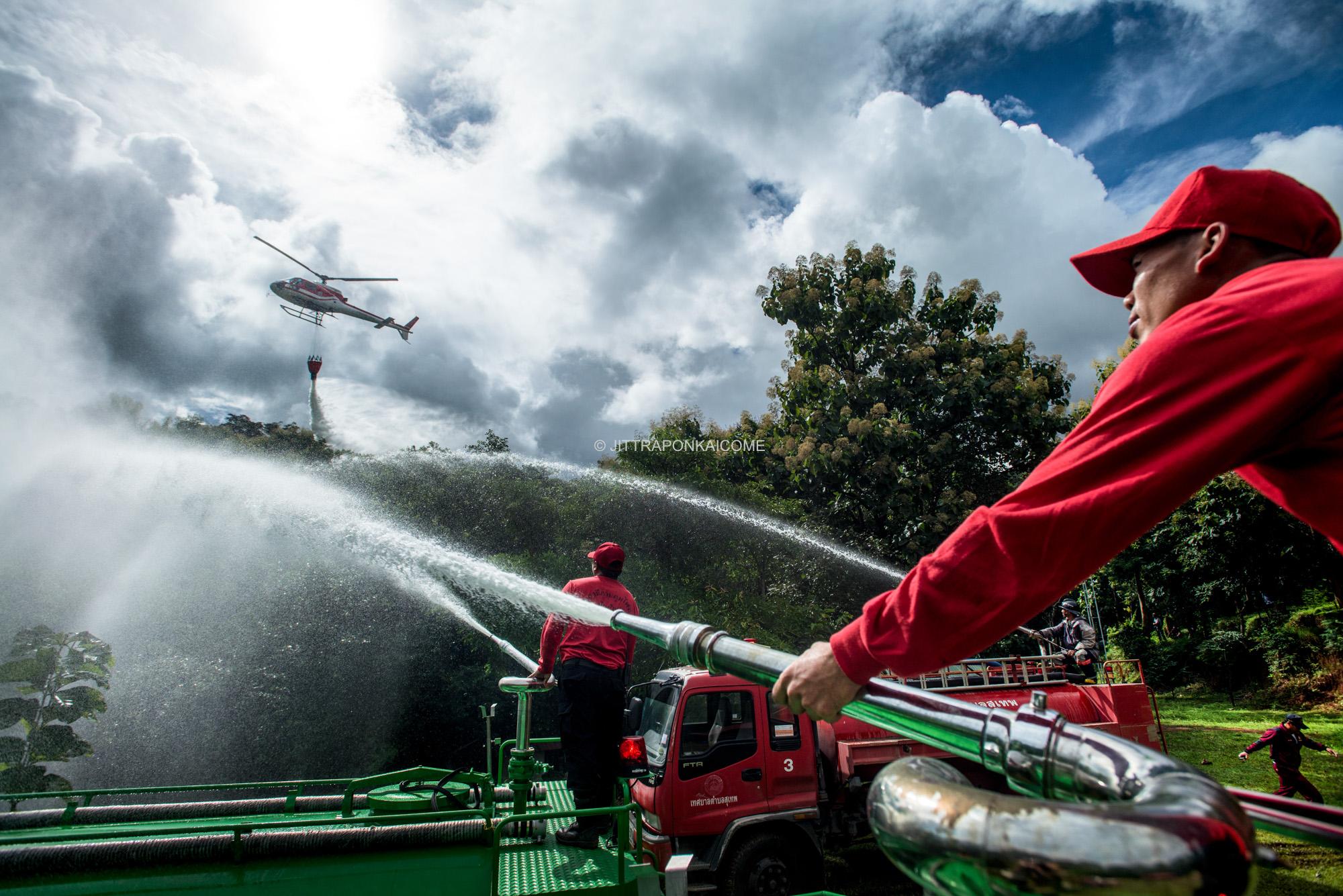  Firefighters demonstrate the capability of handling a wildfire. Chiang Mai, Thailand. 