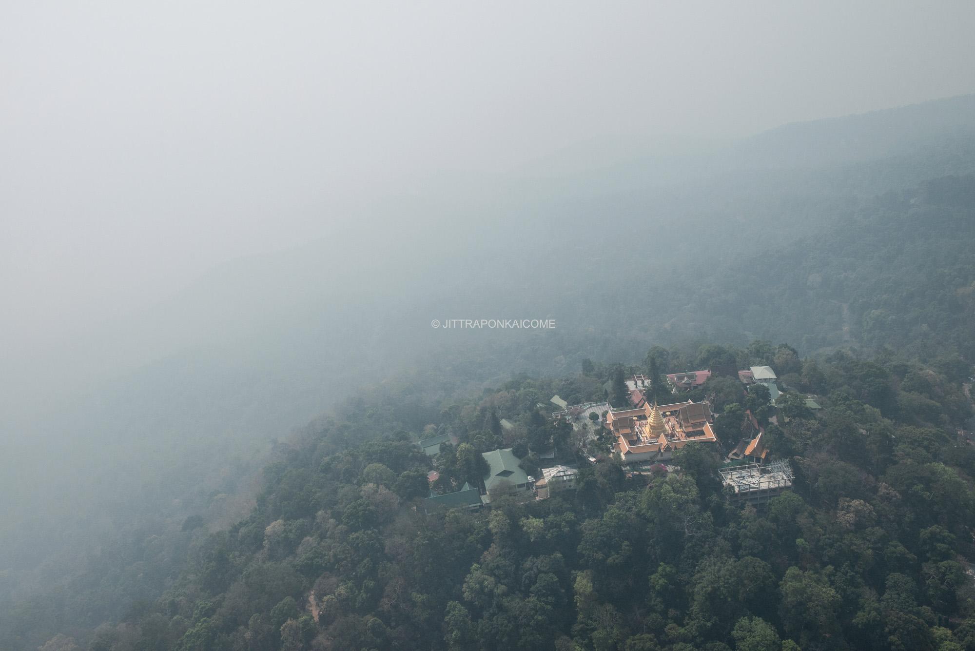 The iconic temple of Chiang Mai on top of the mountain has been covered by the smoke crisis. 