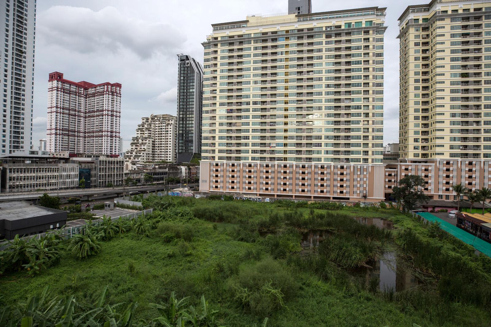 SOUTHEAST ASIA'S DENGUE EPIDEMIC -   BANGKOK, THAILAND    Huge condominium buildings sit...