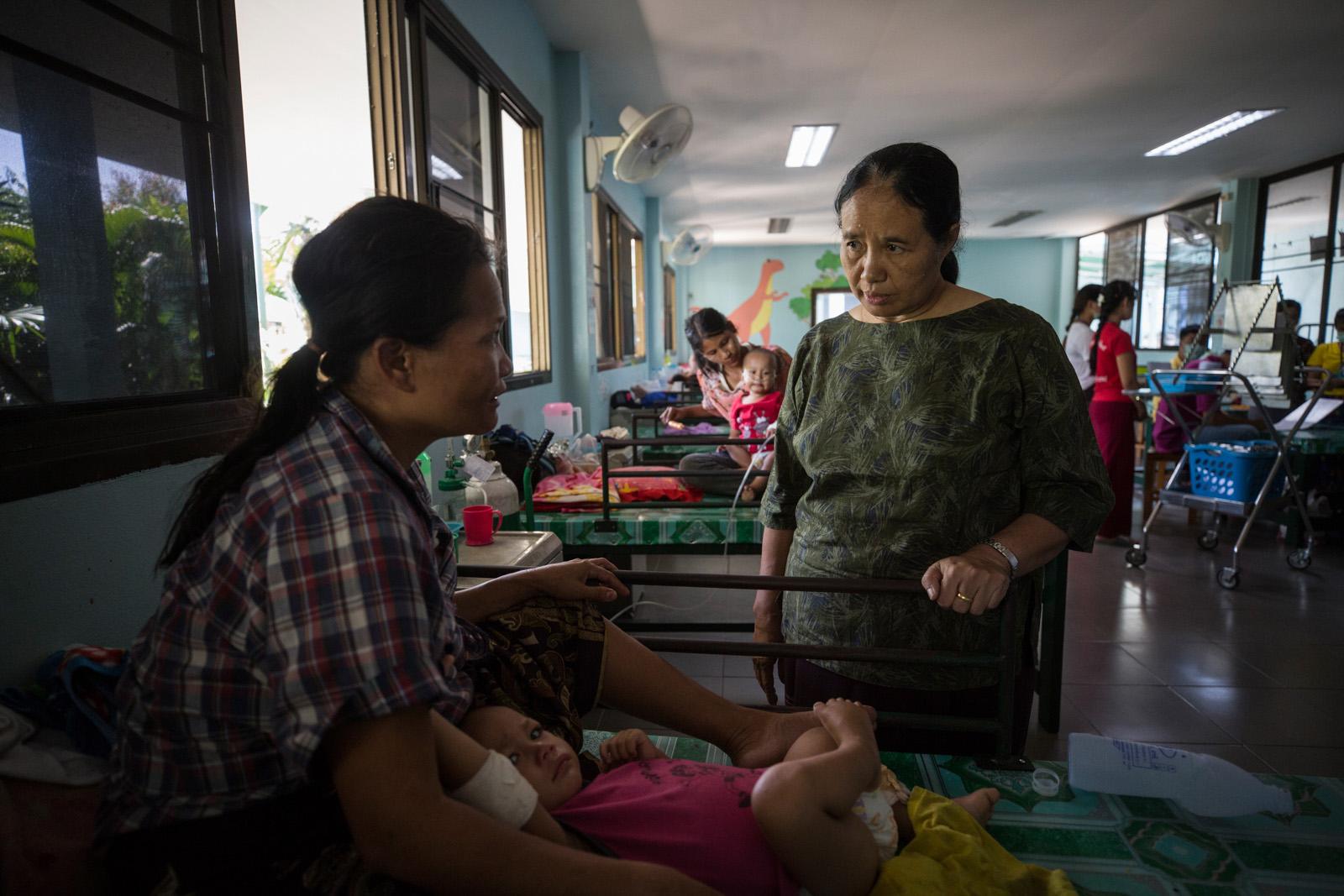 SOUTHEAST ASIA'S DENGUE EPIDEMIC - Dr Cynthia Maung, founder of Mae Tao clinic, visits a...