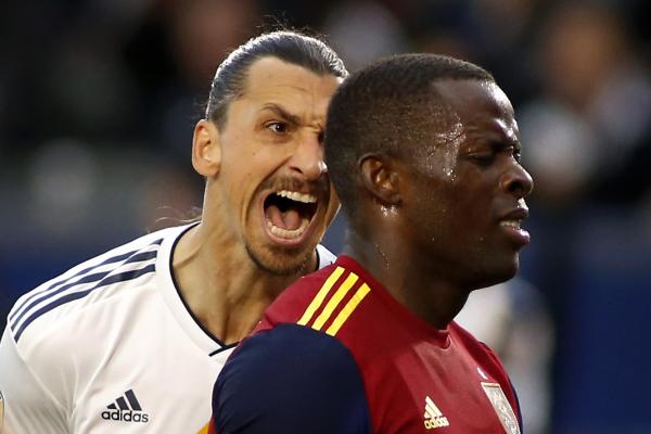 CARSON, CALIFORNIA - APRIL 28: &nbsp; Zlatan Ibrahimovic #9 of Los Angeles Galaxy taunts Nedum Onuoha #14 of Real Salt Lake after scoring a goal during the second half of a game at Dignity Health Sports Park on April 28, 2019 in Carson, California. Ibrahimovic fouled Onuoha earlier in the match, and apologized after the game. Onuoha did not accept the apology. (Photo by Katharine Lotze/Getty Images)