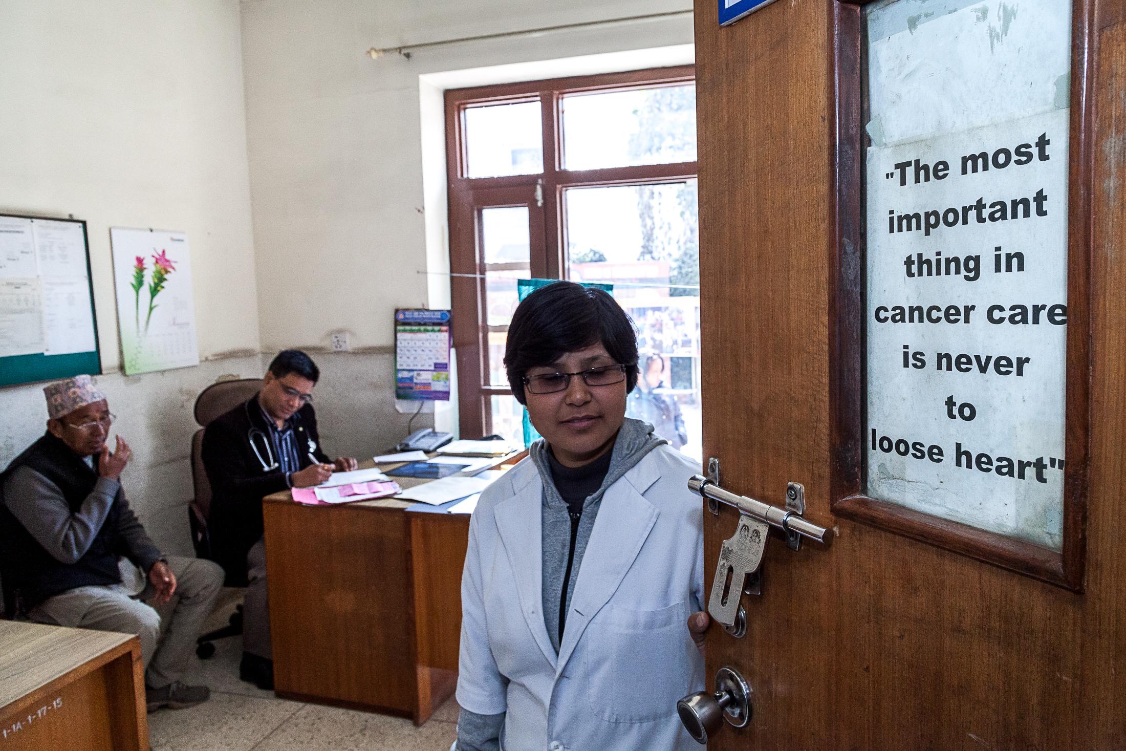 The Big C - BHAKTAPUR, NEPAL- FEBRUARY 02: A nurse closes the door of...