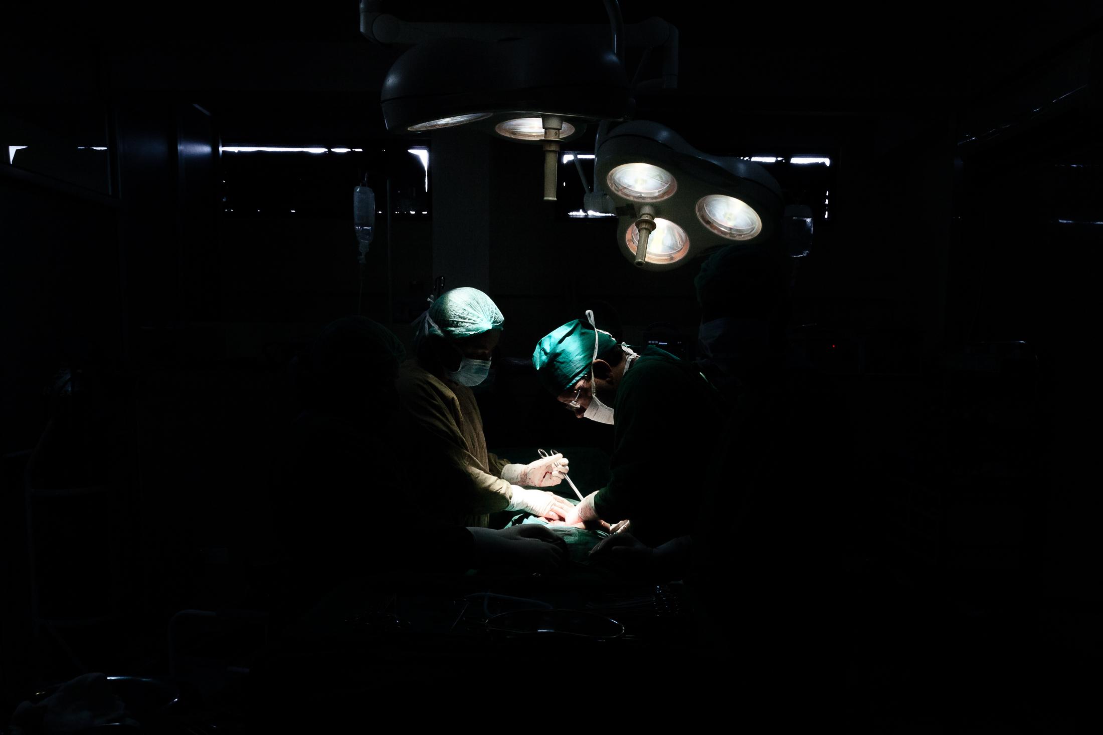 The Big C - BHAKTAPUR, NEPAL- FEBRUARY 02: Doctors perform surgery on...