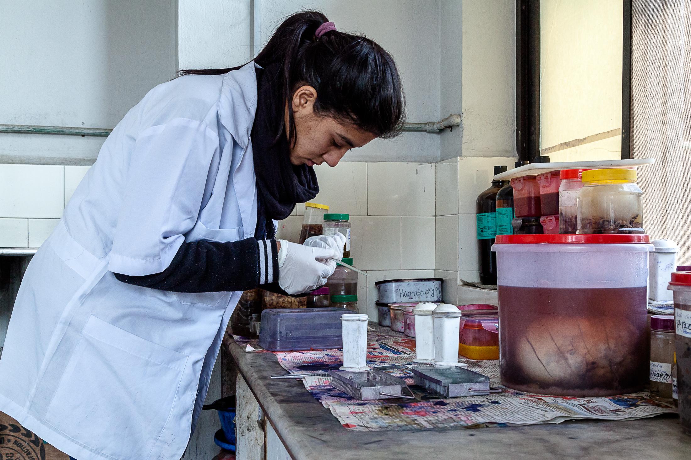 The Big C - BHAKTAPUR, NEPAL- FEBRUARY 02: A nurse examines body...