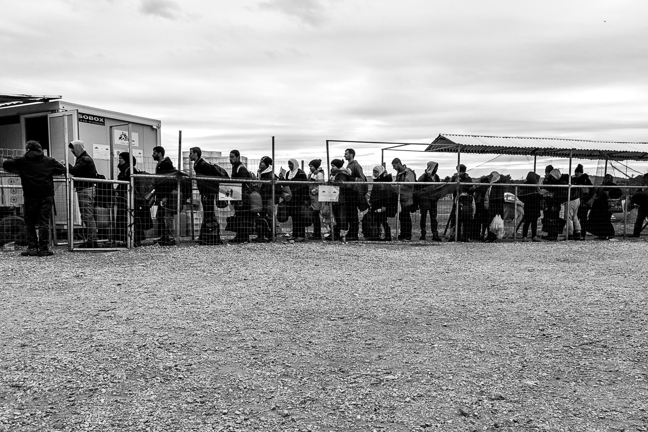 The Way - IDOMENI, GREECE - FEBRUARY 11: Refugees line up to enter...
