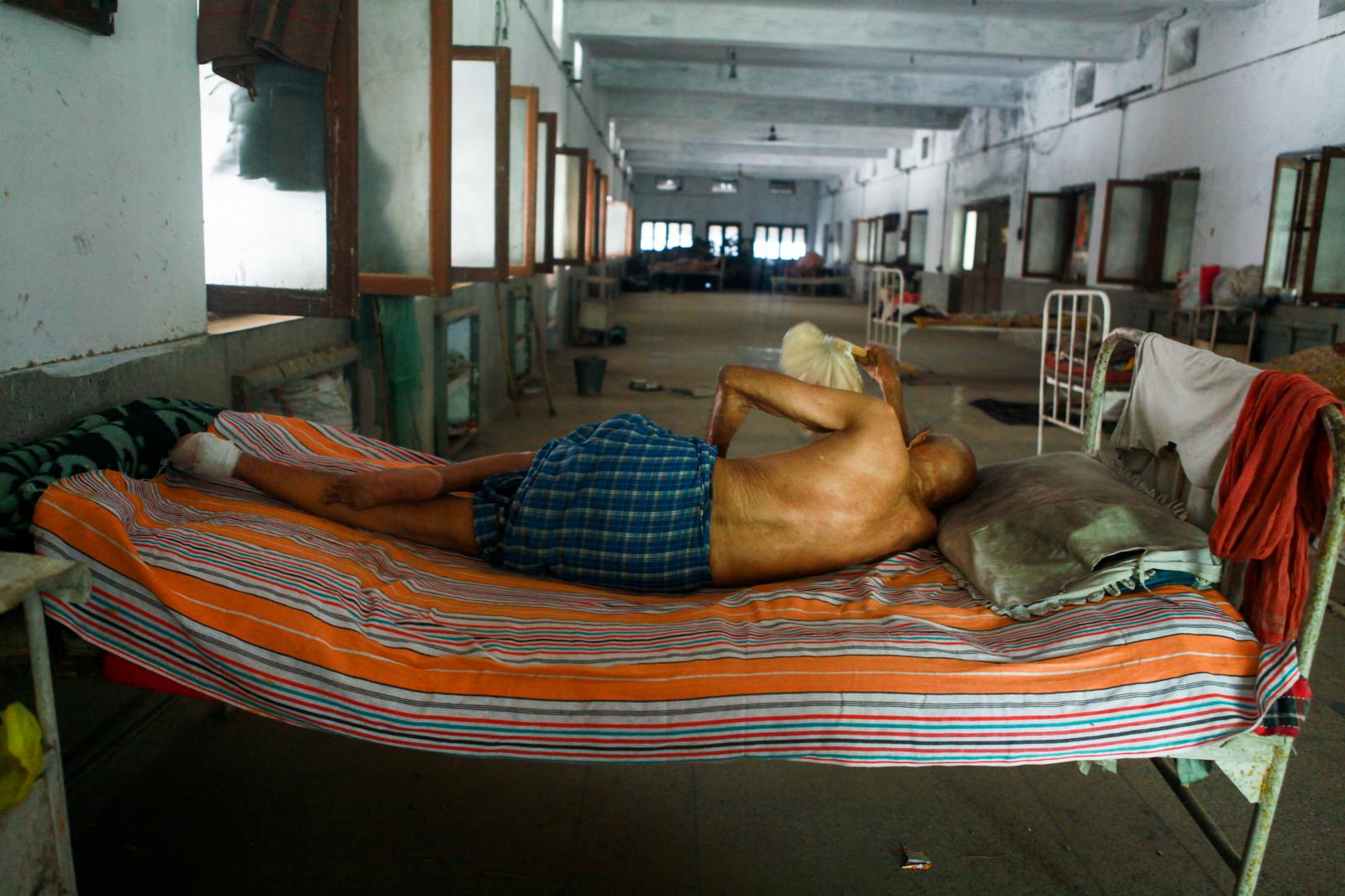  Shivlal Singh lies in his bed ...ranasi,&nbsp; India, 2012. 