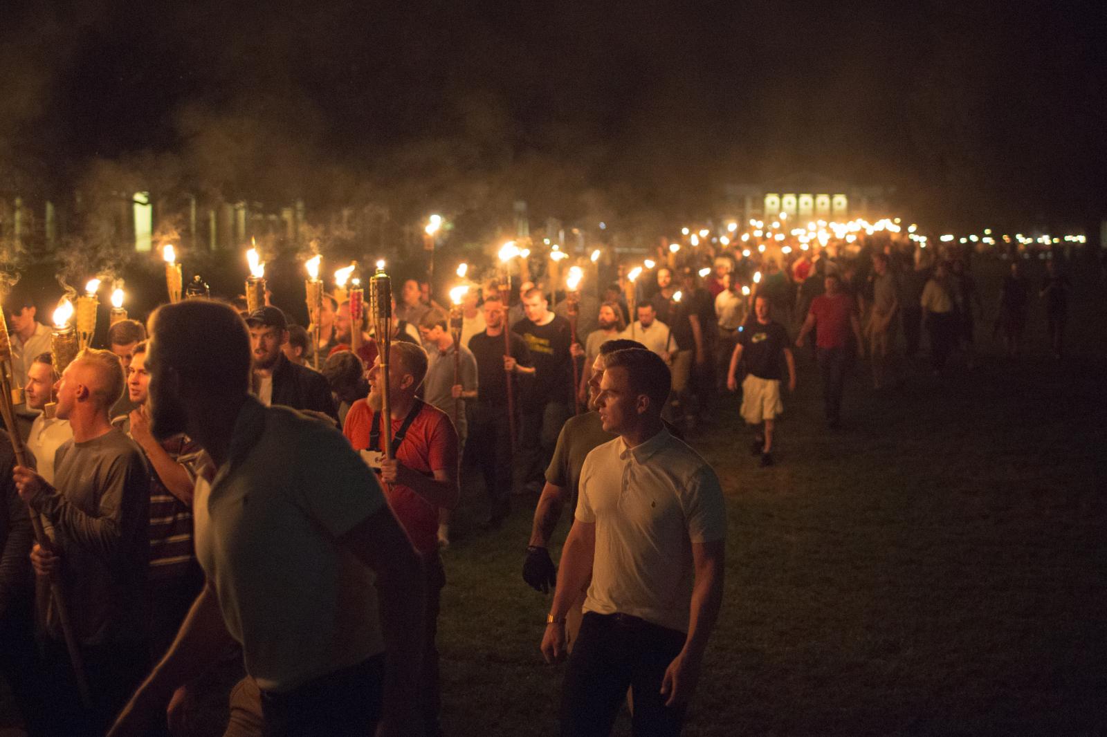Torch-wielding white supremacis...esville, VA on August 11, 2017.