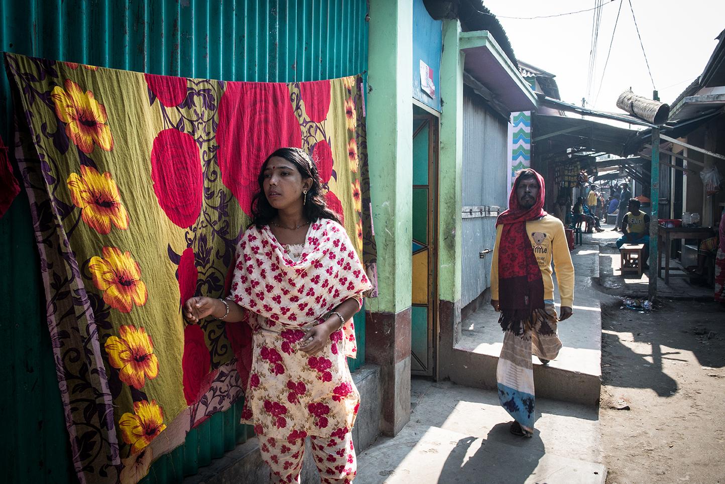 A sex worker calls out to a client in Daulatadia Brothel in Daulatadia, Rajbari, Bangladesh....